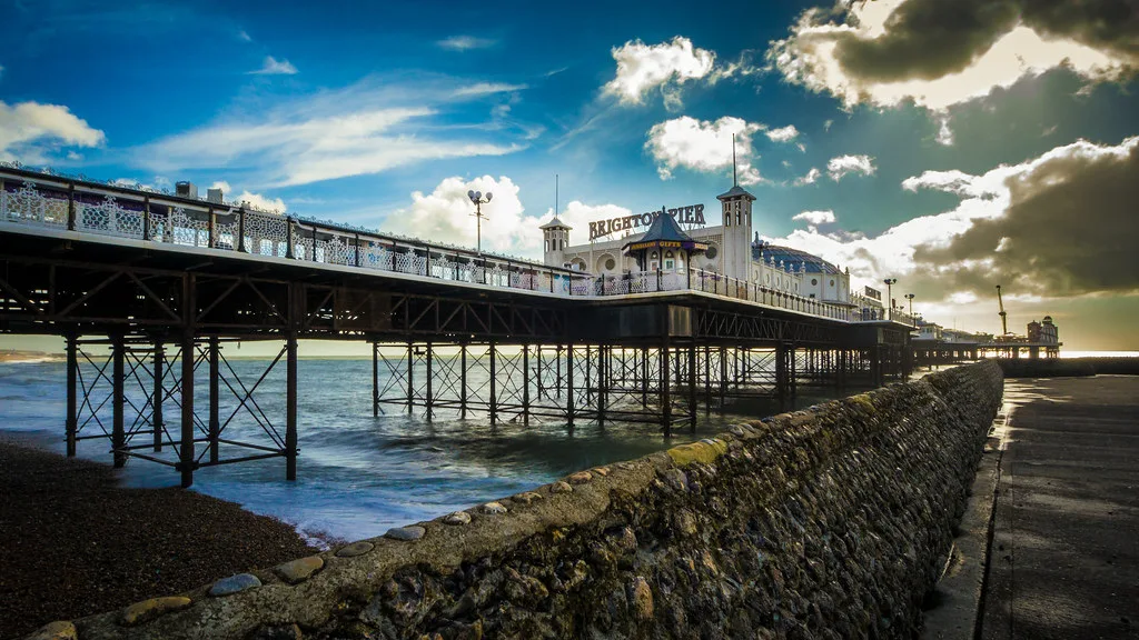 Brighton Palace Pier from the beach, with a groyne in the foreground