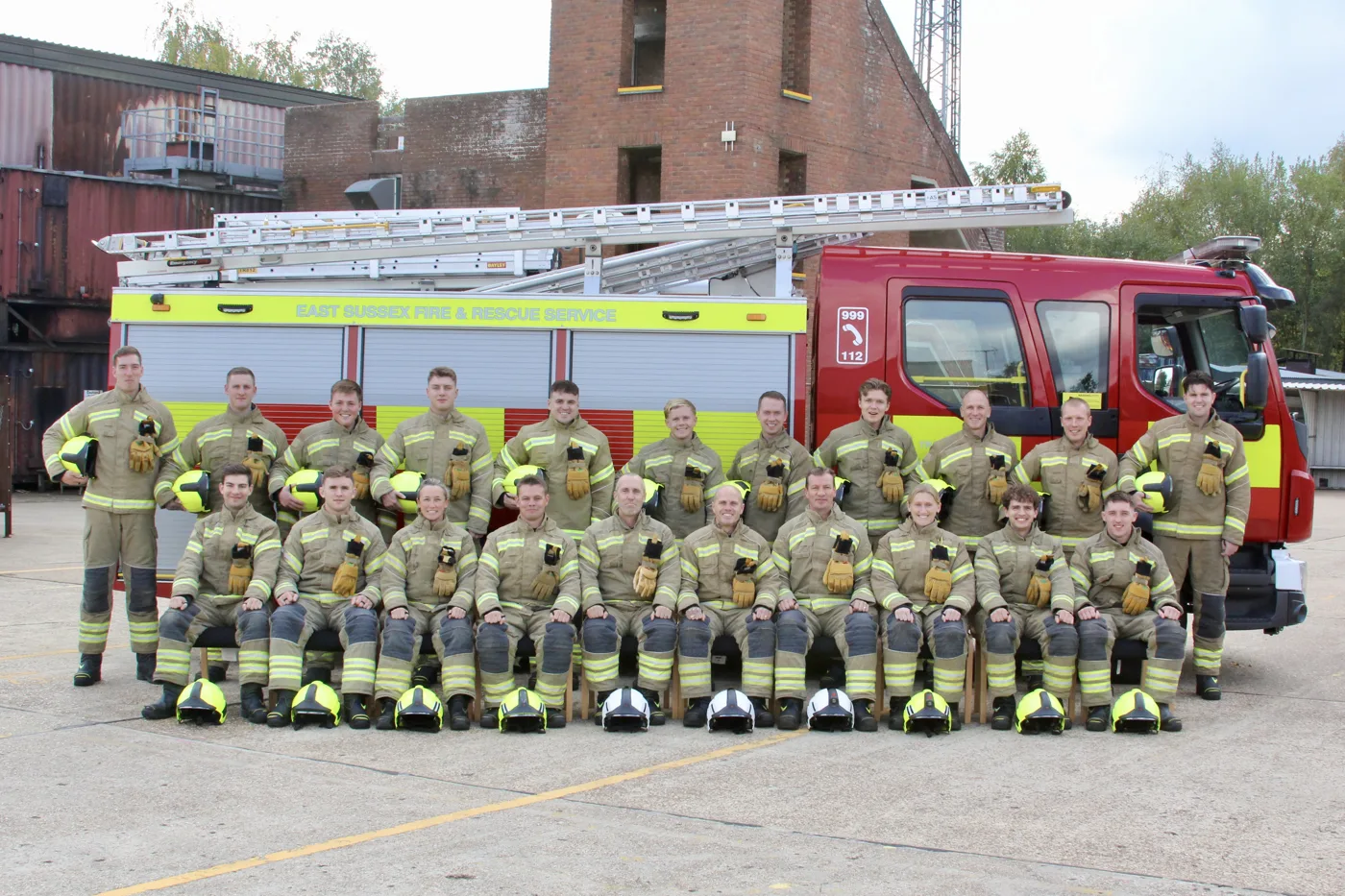 The 43rd Wholetime Firefighter Recruit Course in front of a fire engine at the Service Training Centre in Maresfield