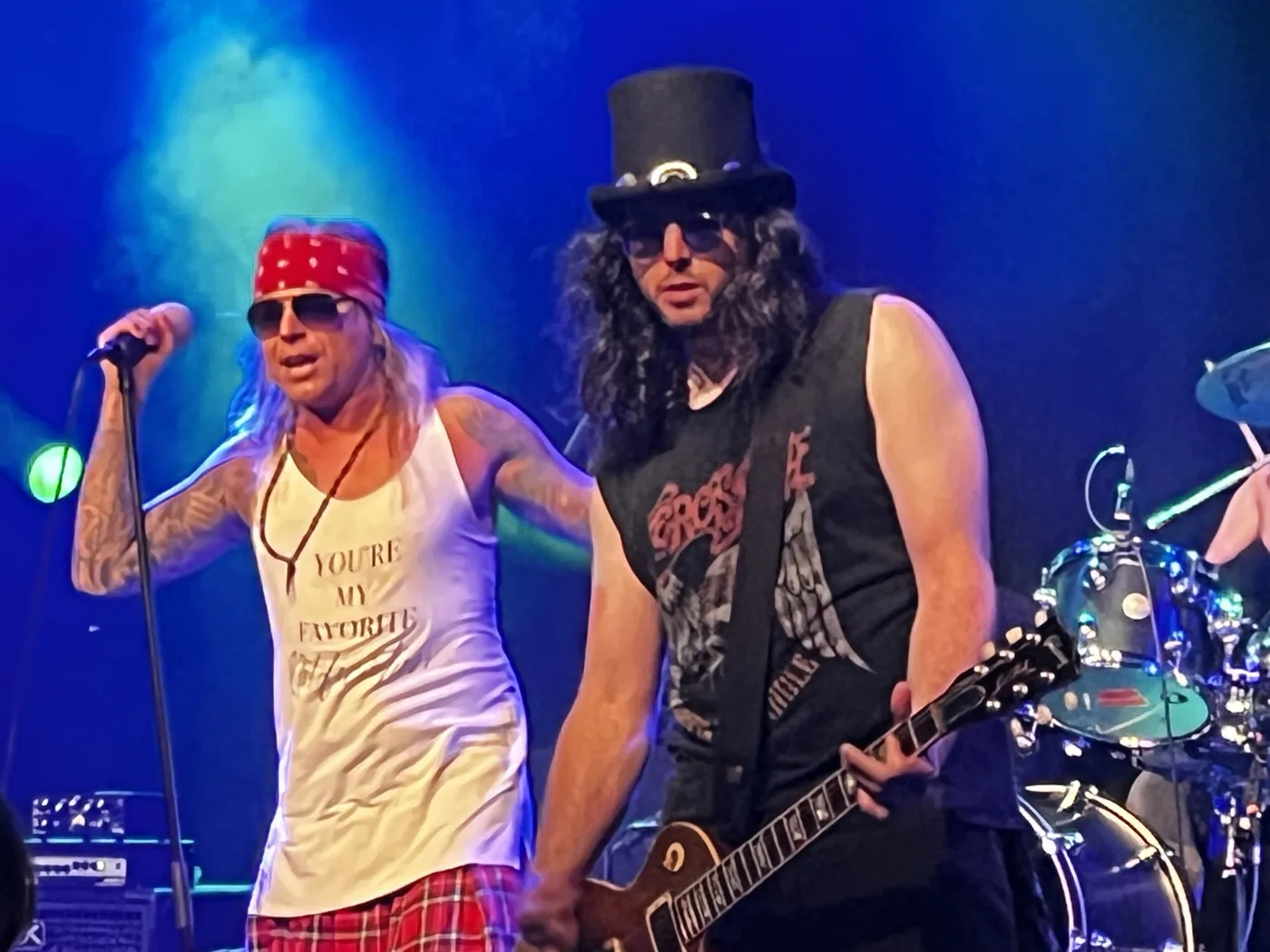 Sidd De Ville as Axl and Jack Warren as Slash on stage with The Guns N Roses Experience