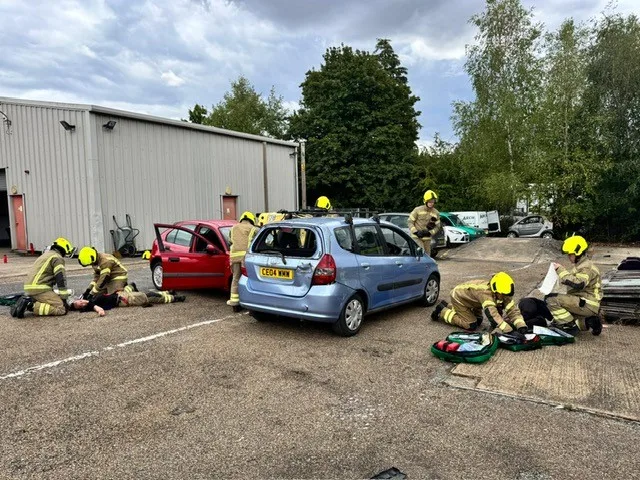 Recruits on East Sussex Fire & Rescue Service's 43rd wholetime course practising a casualty rescue from cars