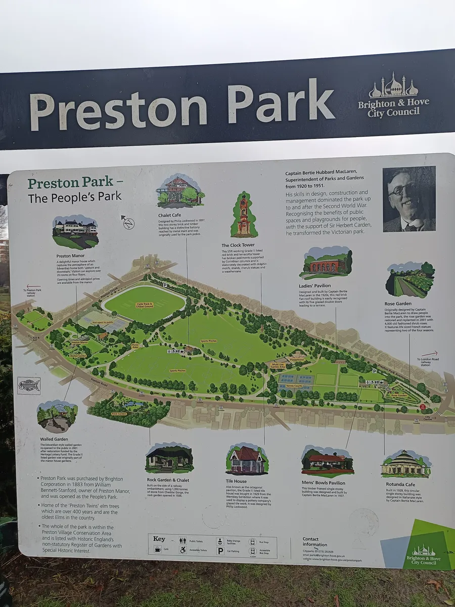 Brighton and Hove City Council map board of Preston Park showing the sports pitches, cycle track, rose garden, Rotunda Cafe and Preston Manor